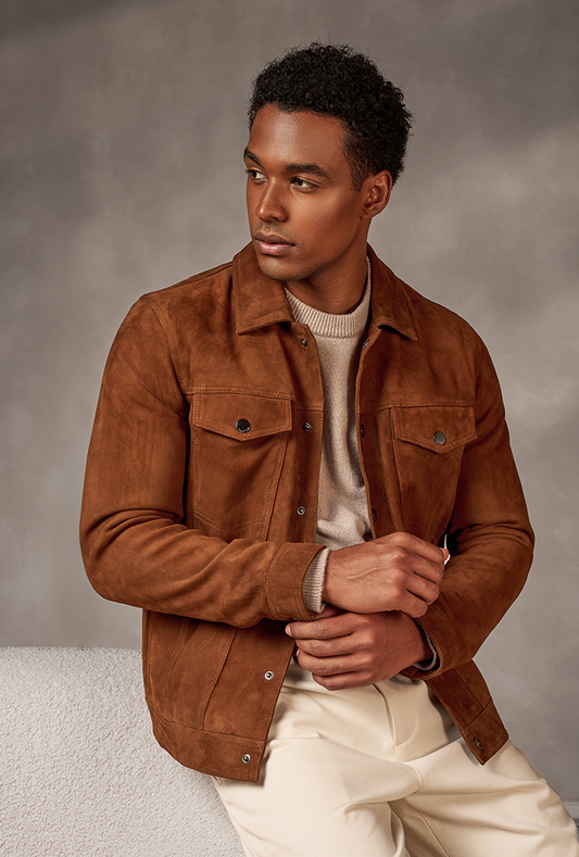 Men’s tobacco brown goatskin suede jacket featuring a classic collar, button front closure, and dual chest pockets for a timeless, rugged look