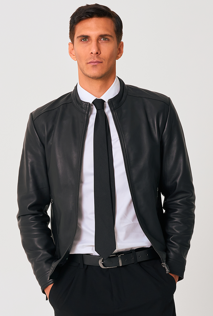 Men’s black genuine lambskin leather biker jacket with a clean, minimalist design, front zip closure, and a slim, lightweight fit. Smart Casual  Men’s black genuine lambskin leather biker jacket with a clean, minimalist design, front zip closure, and a slim, lightweight fit. Smart Casual