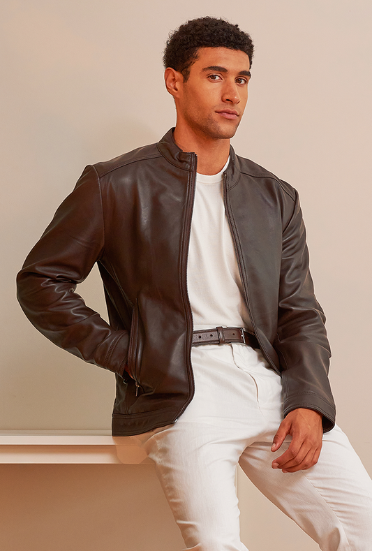 Men’s brown genuine lambskin leather biker jacket featuring a slim fit, front zipper closure, and lightweight construction for comfort and edge