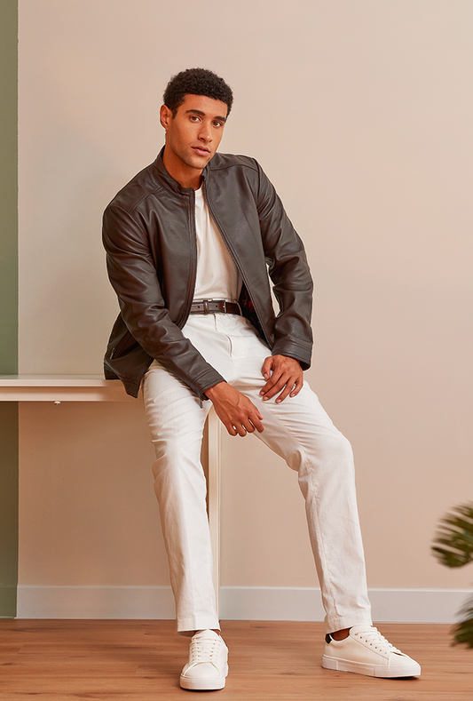 Men’s brown genuine lambskin leather biker jacket featuring a slim fit, front zipper closure, and lightweight construction for comfort and edge