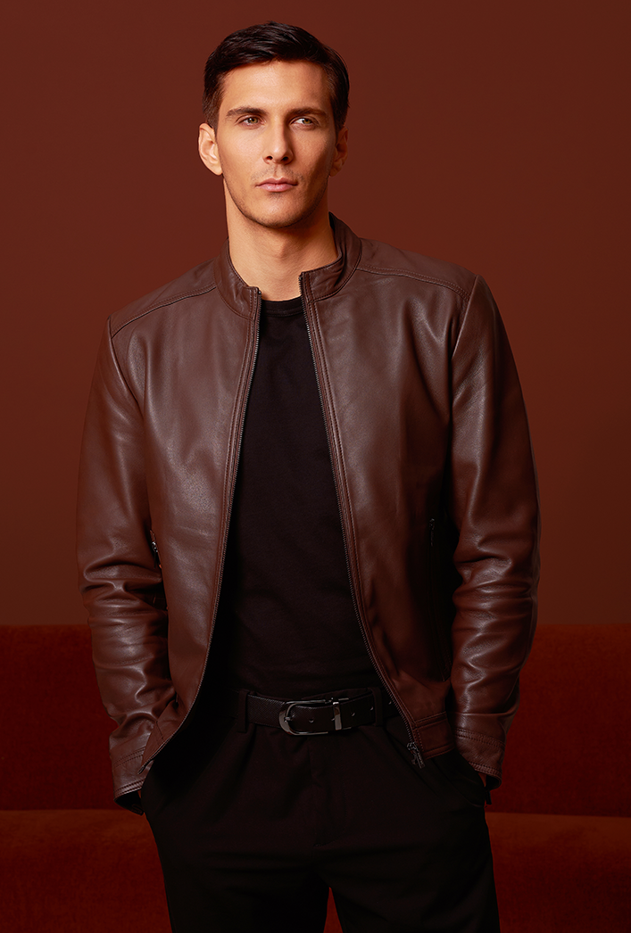Men’s cognac-colored genuine lambskin leather biker jacket featuring a sleek zip closure, biker-style collar, slim fit, and lightweight construction for modern comfort and style Men’s cognac-colored genuine lambskin leather biker jacket featuring a sleek zip closure, biker-style collar, slim fit, and lightweight construction for modern comfort and style