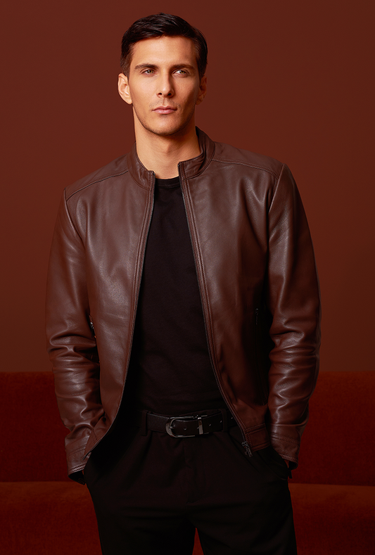 Men’s cognac-colored genuine lambskin leather biker jacket featuring a sleek zip closure, biker-style collar, slim fit, and lightweight construction for modern comfort and style