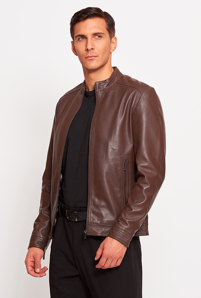 Men’s cognac-colored genuine lambskin leather biker jacket featuring a sleek zip closure, biker-style collar, slim fit, and lightweight construction for modern comfort and style Men’s cognac-colored genuine lambskin leather biker jacket featuring a sleek zip closure, biker-style collar, slim fit, and lightweight construction for modern comfort and style