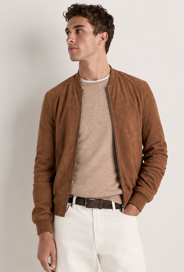 The beauty of tonal dressing lies in the details. Soft neutrals and textured suede come together for a look that feels elevated without trying too hard.