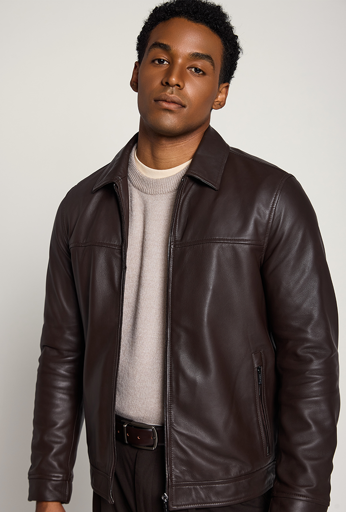 Lightweight brown lambskin leather jacket with a smooth texture, classic shirt collar, and front zipper closure